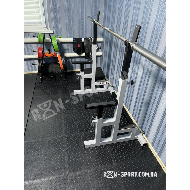 Стійки для присідань / Стійки для жиму лежачи регульовані, зі страховими упорами